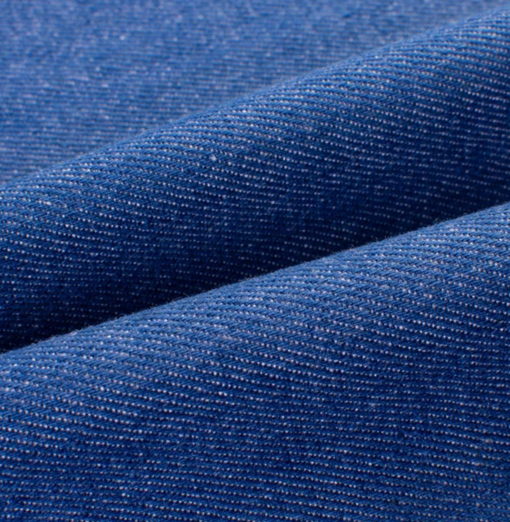 Denim is an extremely versatile fabric made from cotton fibers using a twill weave fabrication method.