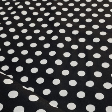 Poly Cotton Printed Fabric Polka Dots is a delightful addition to our extensive fabric collection. 