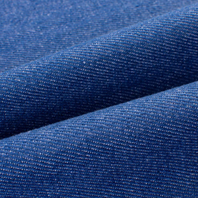 Denim is an extremely versatile fabric made from cotton fibers using a twill weave fabrication method. 