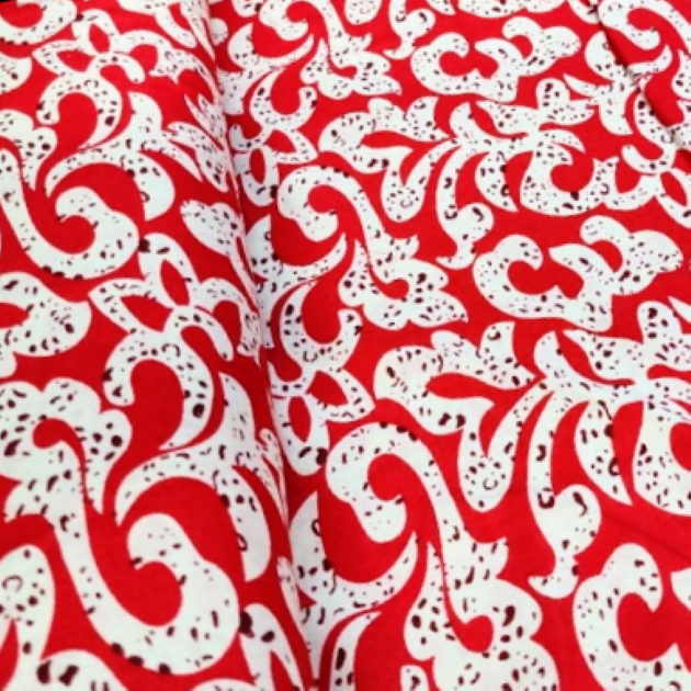 This soft rayon fabric features a delicate floral pattern in a muted shade of red, exuding a timeless charm. Rayon, derived from plants, offers a gentle texture, breathability, and utmost comfort. Its flowing drape enhances the elegance and femininity of any clothing endeavor.